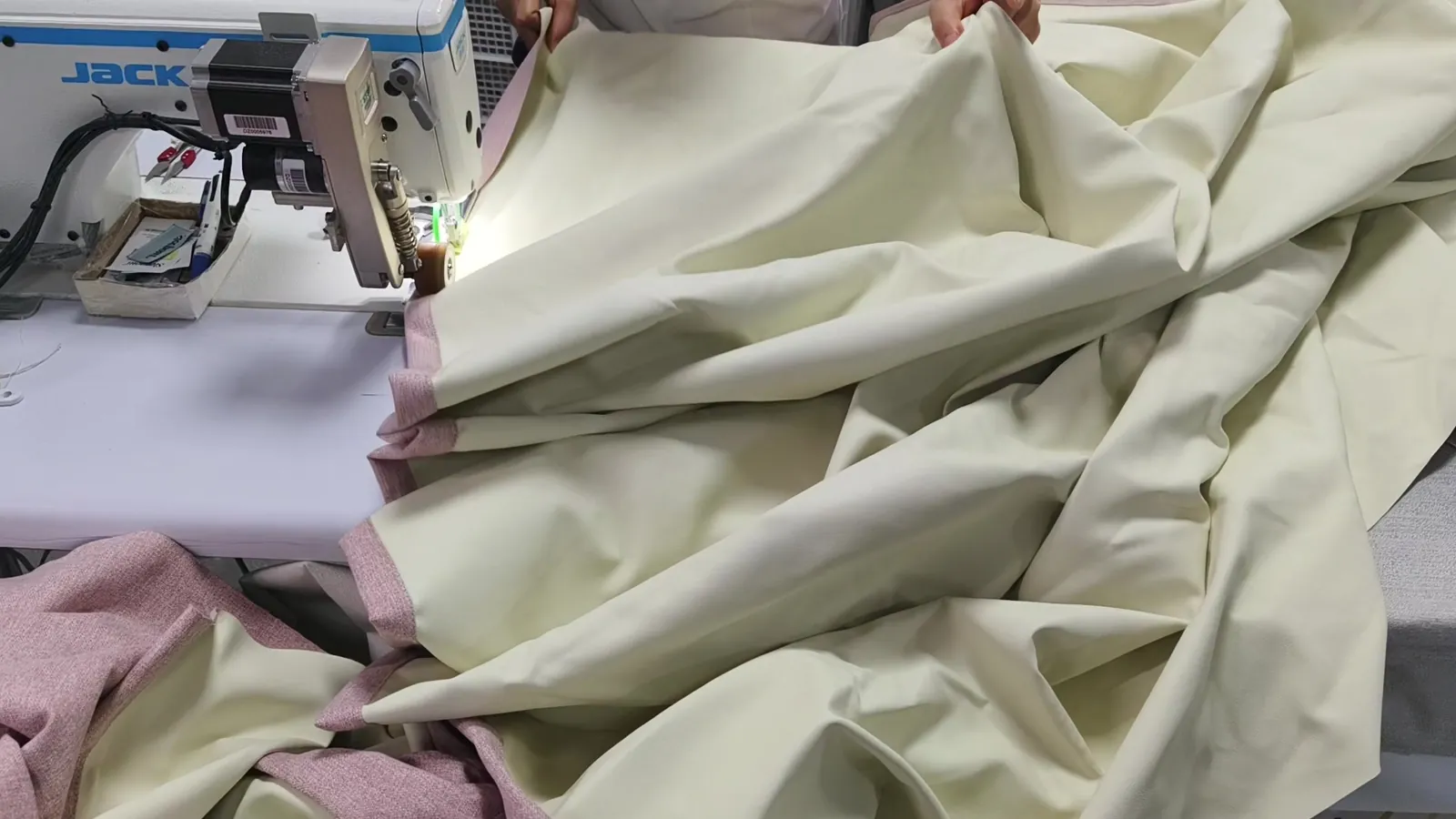 Curtain panel being sewn on an automated JACK station