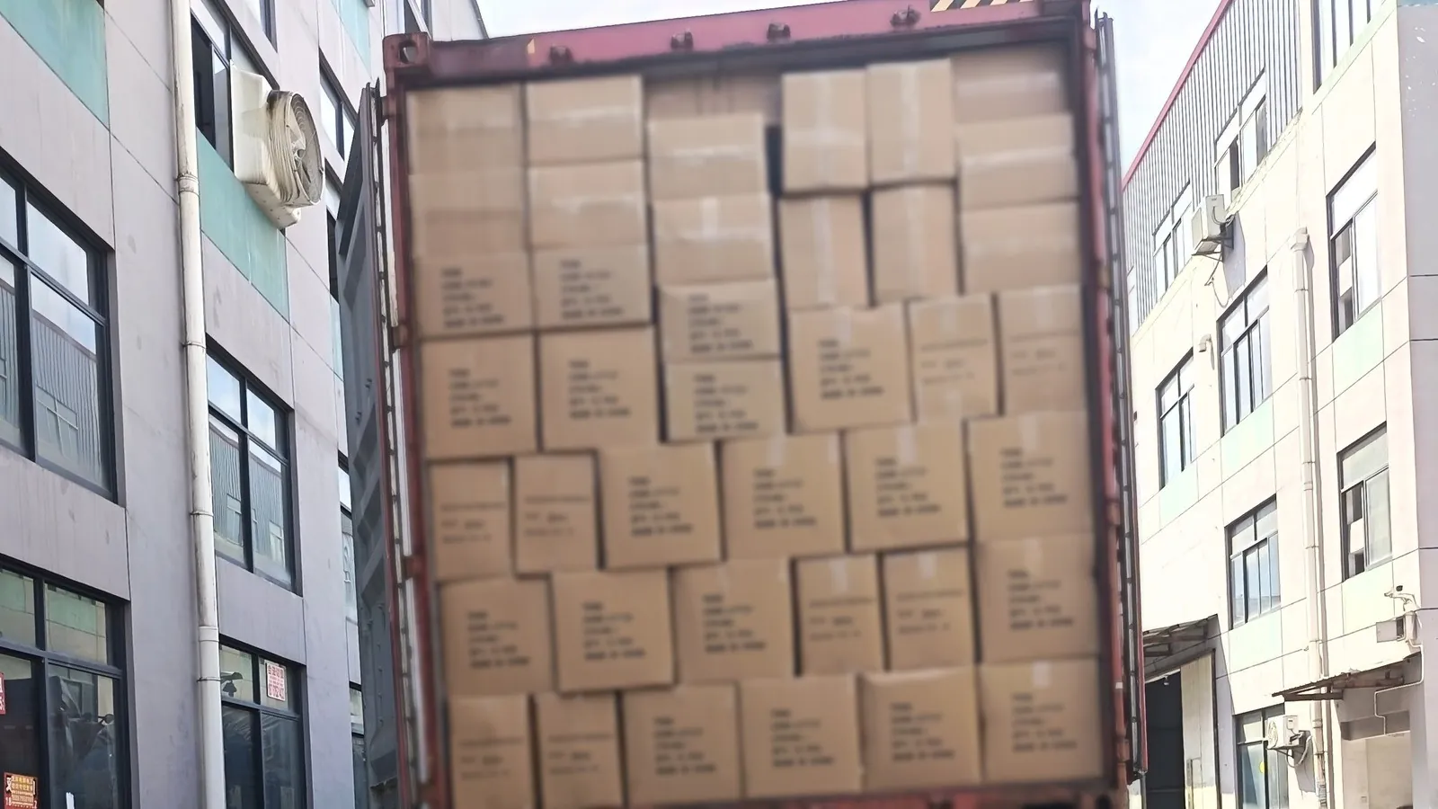 Container loaded with curtain cartons at the Xinlan factory