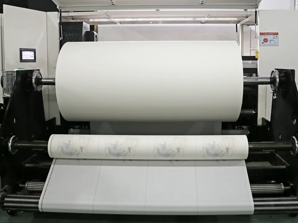 Digital printing machine with a fabric roll