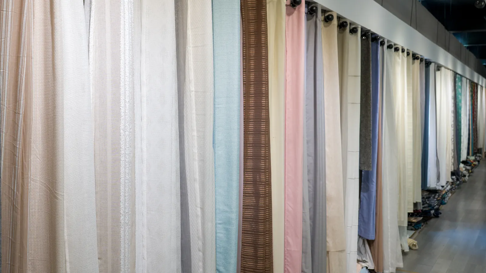 Curtain samples hanging in the Xinlan showroom